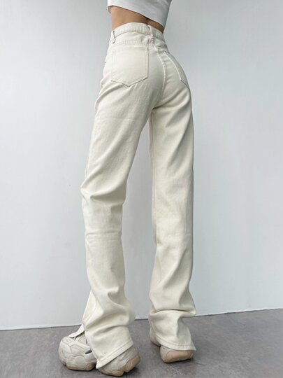 Wearing supermodel legs, American retro high-waisted slimming jeans with leg slits and floor-length jeans, versatile straight-leg trousers for spring and summer.