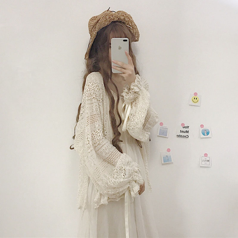 Middle and long hollow lace blouse sun-proof long sleeve sweater thin snow shirt coat spring