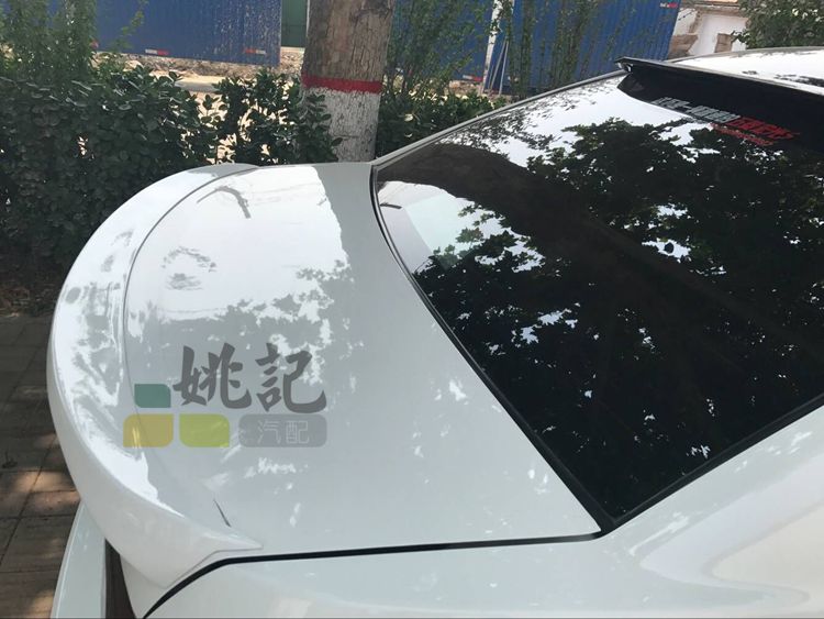 Dongwangyang Cruze sửa đổi đuôi Sanjing đấm gió miễn phí 09-14 đặc biệt Chevrolet Duckbill độ đuôi gió xe ô tô