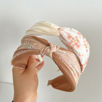Exquisite and elegant floral headband simple and versatile printed fabric wide-brimmed knotted headband cross hair hole hair accessory