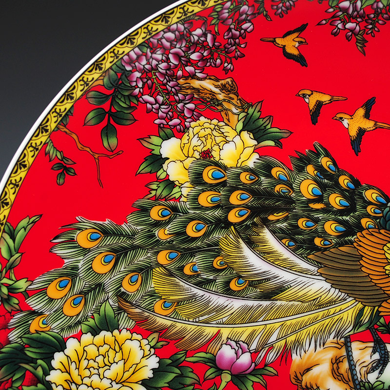 The peacock figure hanging dish decorative porcelain jingdezhen ceramics sit plate wall of sitting room home Chinese handicraft furnishing articles