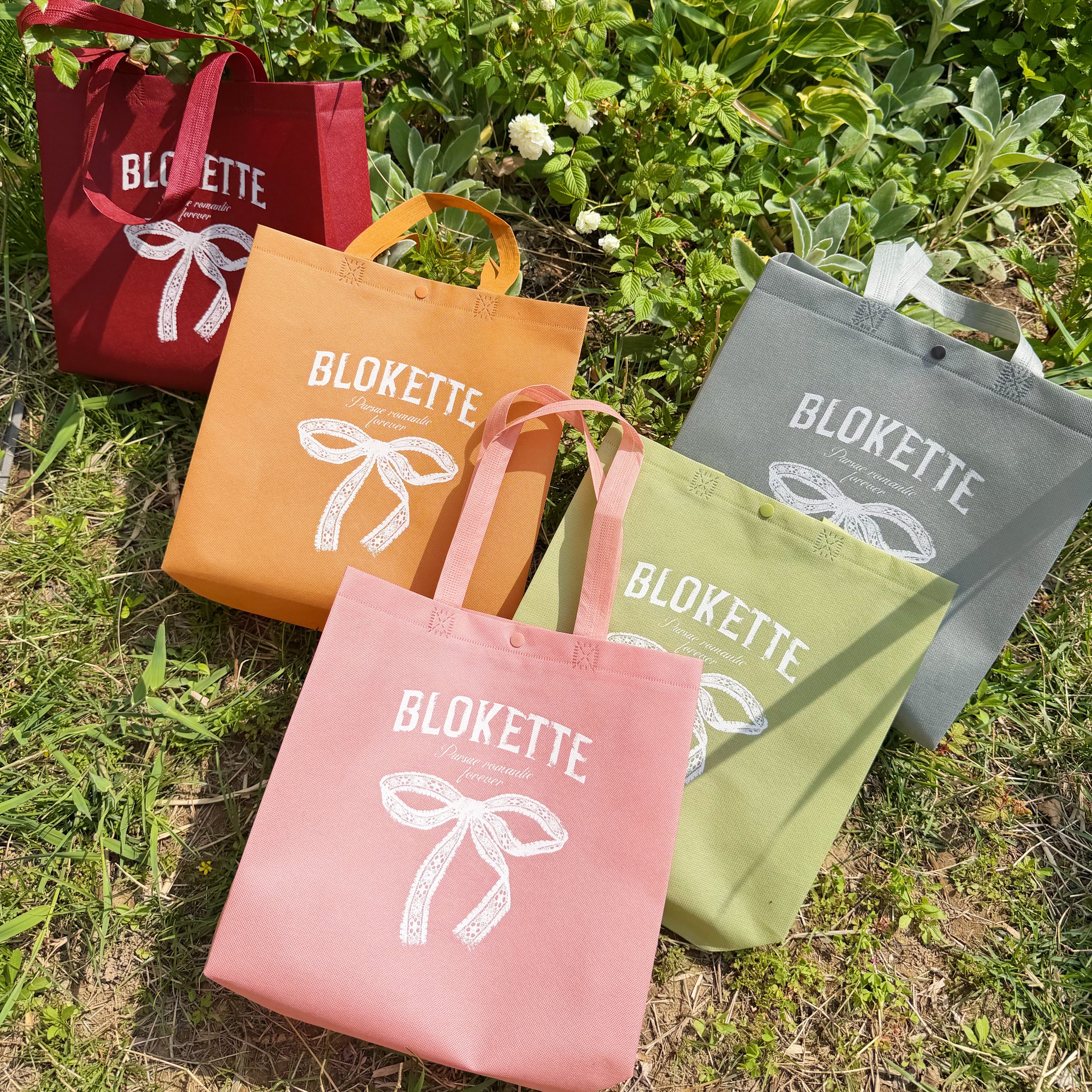 Elegant bow non-woven bag custom-made clothing store bag Internet celebrity hand-held women's shopping bag custom logo