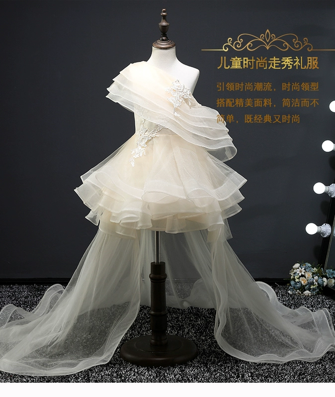 Hoa cưới cô gái tutu mẫu catwalk ngắn trước đuôi dài một bên vai đầm trẻ em trang phục piano
