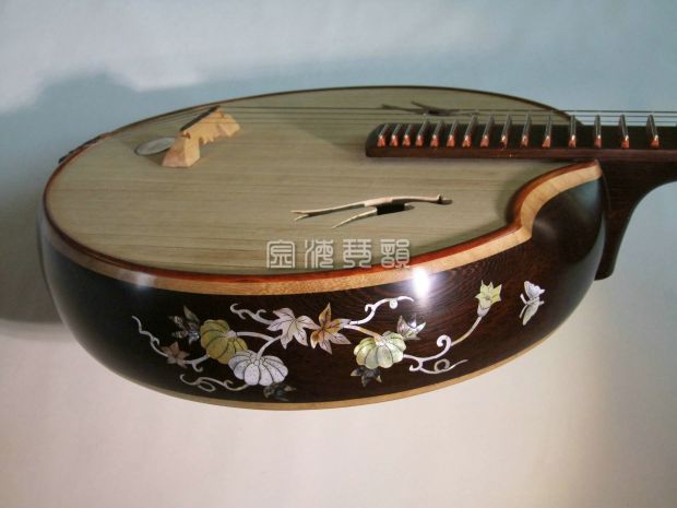 Hà Bắc Raoyang Nhạc cụ miền Bắc Chuyên nghiệp Cánh gà Gỗ Vỏ khắc Trung Quốc Quà tặng Nhà máy Đặc biệt trực tiếp - Nhạc cụ dân tộc mua sáo
