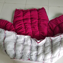 The Pumpkin Sofa covered with a shades of grey cloth.