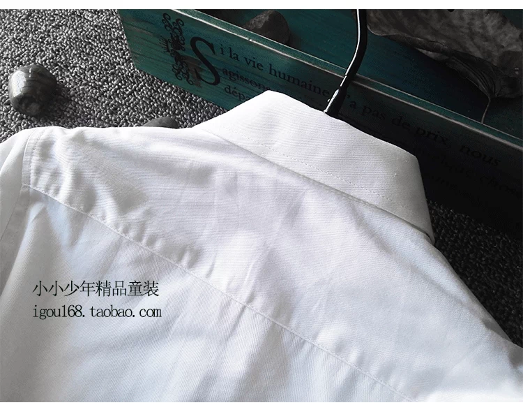 Áo sơ mi trắng tay dài cho bé trai và bé gái kho báu chất béo cộng với phân bón XL áo sơ mi biểu diễn quần áo đồng phục tiểu học và trung học áo kiểu suông bé gái