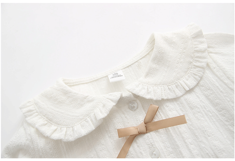 Xuân 2018 mới bé gái sơ mi cotton cotton sơ mi hoang dã bé sơ mi chạm đáy áo sơ mi búp bê trẻ em sơ mi trắng cho bé trai
