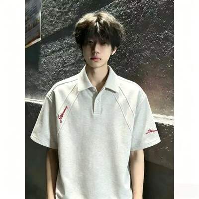A men's summer American heavy-duty lapel POLO shirt with white floral and grey patchwork embroidery, featuring a high-end half-sleeved look