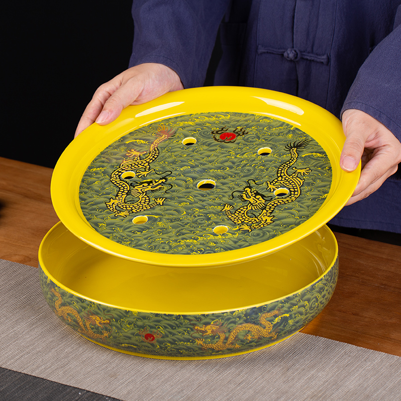 Jingdezhen ceramic tea set suit household of Chinese style kung fu tea taking round a cup of tea with tea tray cups of a complete set of the teapot
