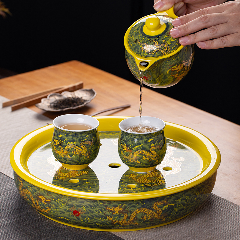 Jingdezhen ceramic tea set suit household of Chinese style kung fu tea taking round a cup of tea with tea tray cups of a complete set of the teapot