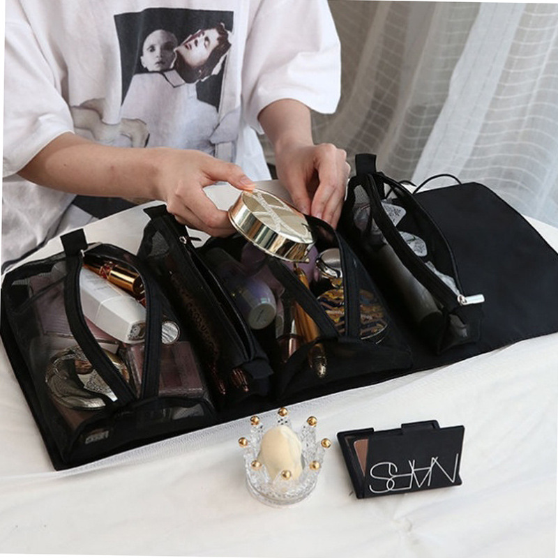 Net Red Makeup Bag 2021 new female superfire portable face value classification for high level sense travel wash up cashier bag