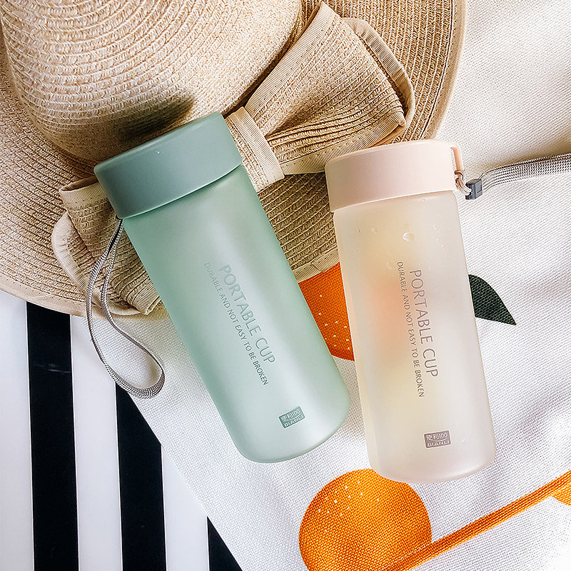 Korean version of minimalist Mini portable water glass male and female student cute frosted with lifting rope Summer plastic cup anti-leaking cup
