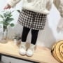 Bé gái mặc váy len mùa thu và bông nhồi bông cho bé gái 1235-7 tuổi thủy triều bé bé váy ngắn shop quần áo trẻ em