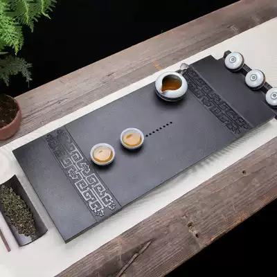 Natural black gold stone tea tray Small large drainage stone stone Black gold stone tea sea household stone tea table