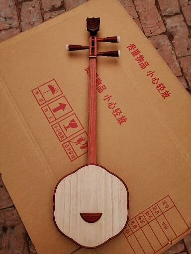 Manufacturer direct selling ethnic musical instrument tap red plum Qin Qin to send the violin bag pluced sheet 980