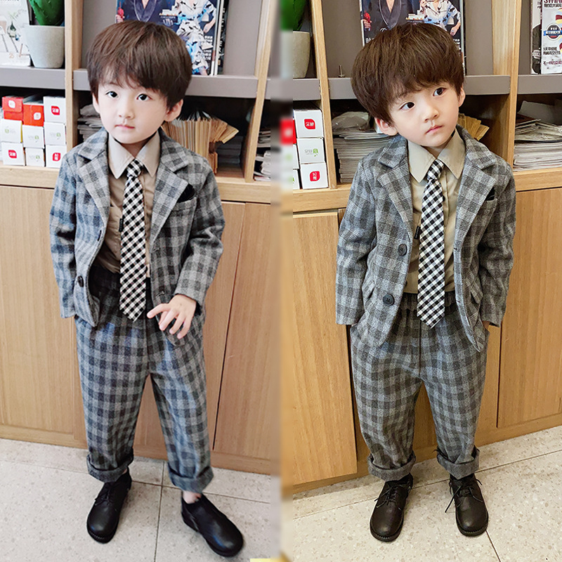 Boy's checkered small suit suit handsome gas baby Sui suit Two sets of children walking show Flower Boy Gown Tide