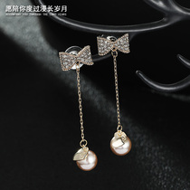 Ear clip Xianqi Mori Super fairy earless female Pearl advanced bow earrings long earrings French Net Red