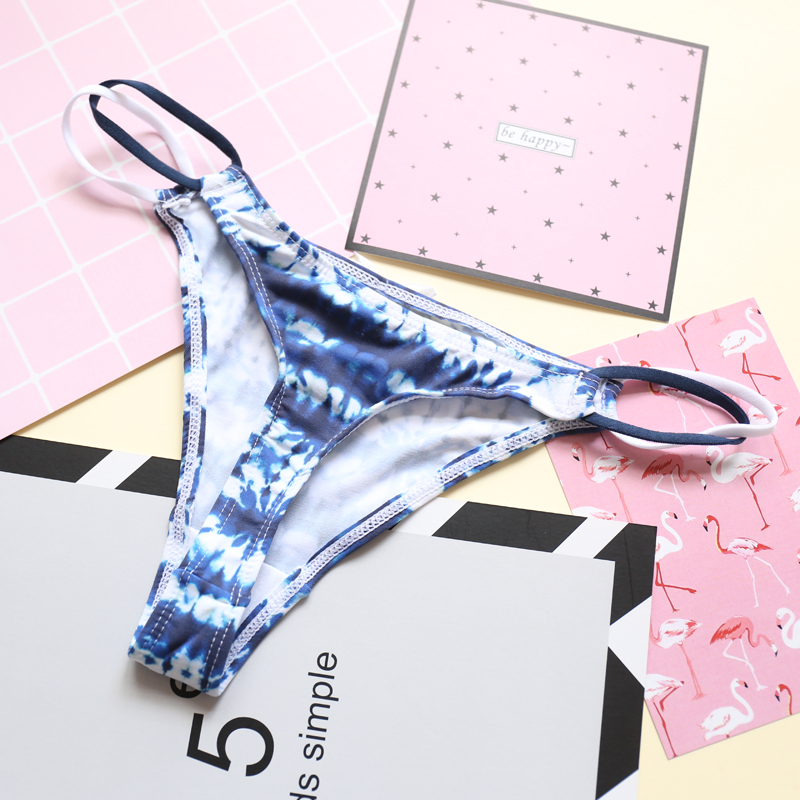 428 Jiajia Thiên thần dễ thương Sexy Lady Thong Girl Pure Color Silk Silk No Trace Low Eo Brief T Quần quần sịp nam