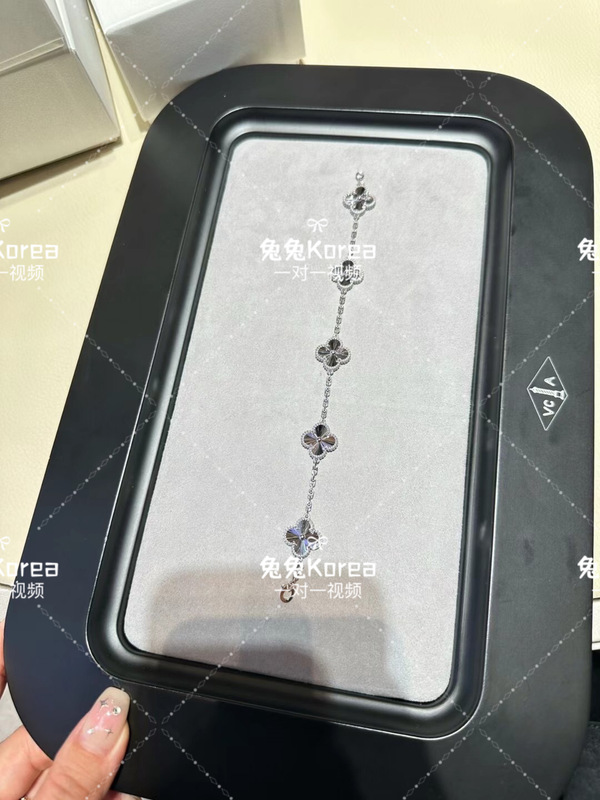 Vca Van Cleef & Arpels Platinum Laser Engraved Five-Flower Bracelet Vca Van Cleef & Arpels Platinum Laser Engraved Five-Flower Bracelet