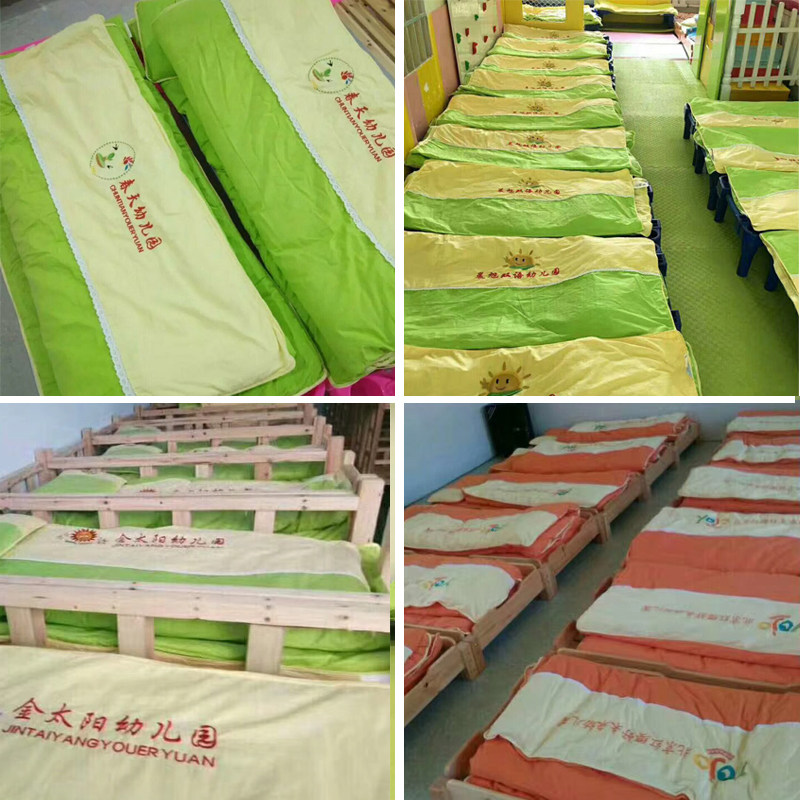 Custom-made solid color embroidered LOGO kindergarten quilt three-piece cotton mattress nap into the garden Six-piece set of early education