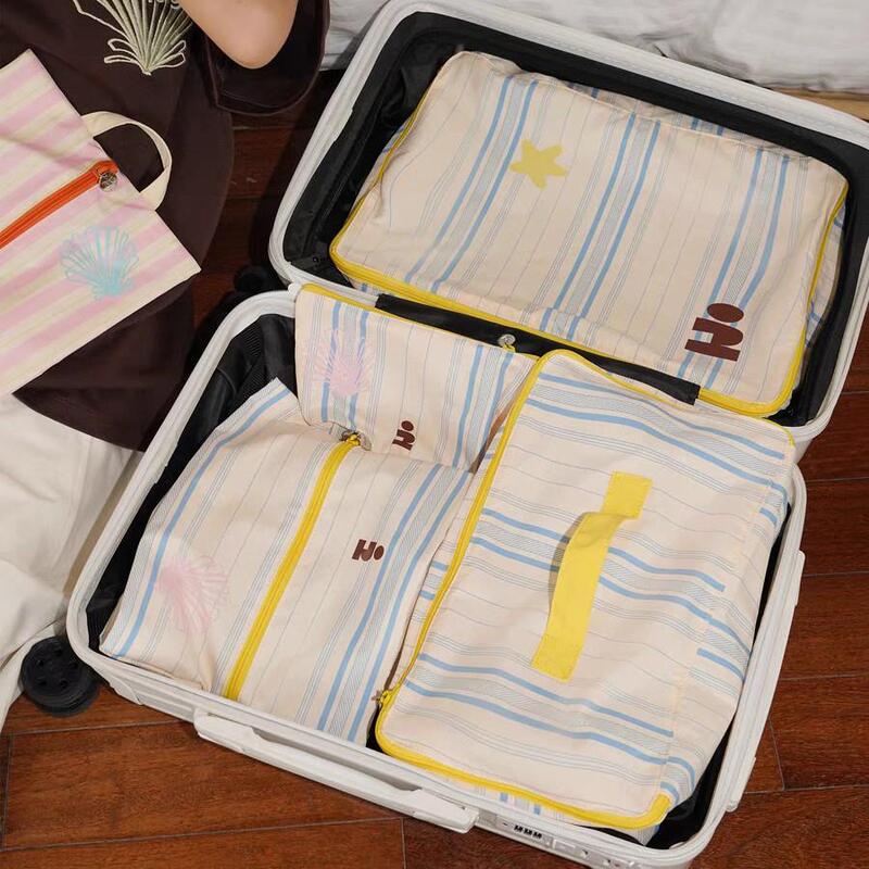 Tagi.《Tapi Star》Printed Cute Striped Portable Packing Bag Suitcase Four-Piece Set Storage Bag