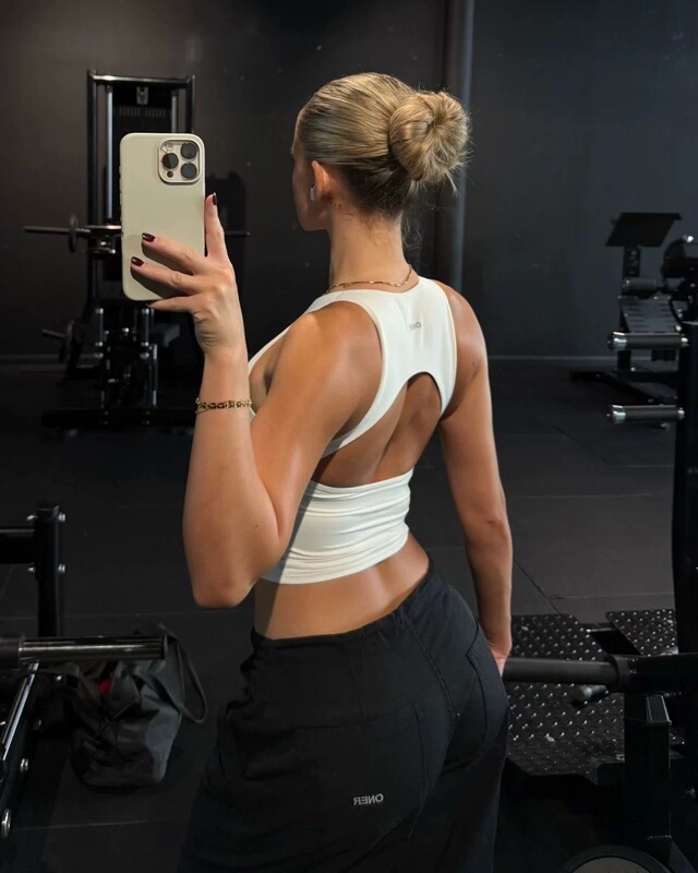 Oneractive Softmotion Back Support Vest ™ High Neck Mid-Length Tank Top with Built-In [Something - Likely Padding or Support].