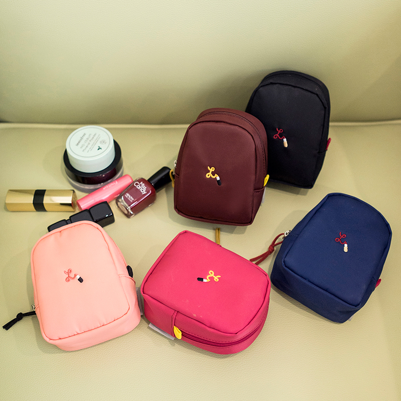 Simple solid color embroidery cosmetic bag Portable Mini Portable Mini Waterproof storage bag lipstick air cushion cream makeup small bag