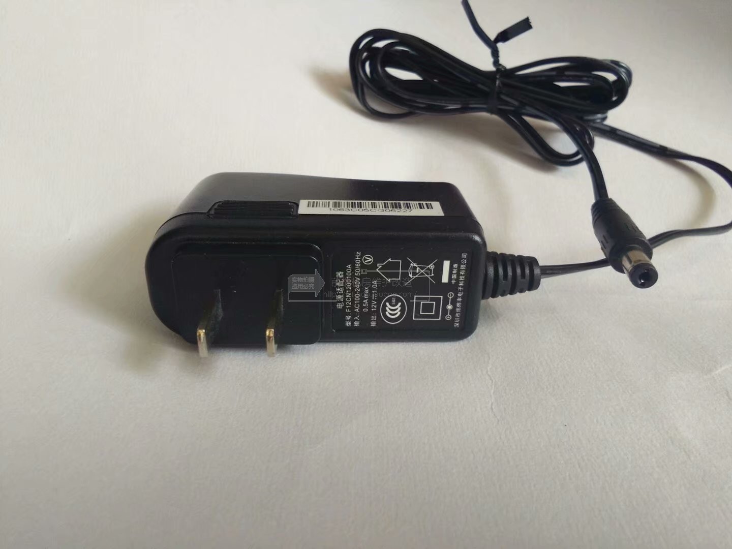 f12cn1200100a power adapter input ac100-240v50 60hz0 5a max 12v-1a