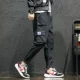 Quần yếm nam thương hiệu xà ngang chân Yu Wenle lỏng lẻo siêu lửa hip hop quần chín điểm quần harem quần âu