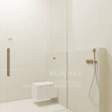 Усовершенствованная кожа молоко белая плитка для ванной плитка плитка гостиная 2023 Новый теплый цвет 60x120 Туалетная плитка для туалетной стены