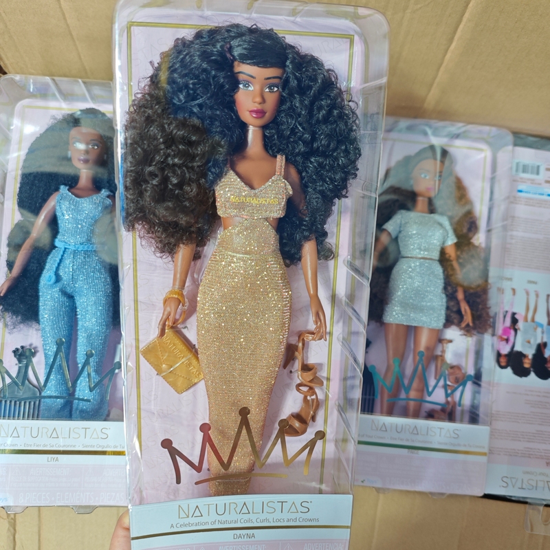 Italian Dayan Barbie Doll Has Richly Textured Hair and Wears a Golden Tight-Fitting Dress, a Hair-Styling Doll