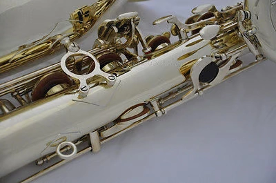 Mua sắm saxophone chuyên nghiệp Taishan đồng Unacquer baritone Eb chơi nhạc cụ thấp saxophone / ống - Nhạc cụ phương Tây kèn saxophone điện tử