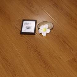 Jinan 12mm reinforced composite floor heating special imitation bright surface sealing wax Waterproof wood floor factory outlet
