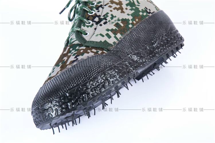 Mùa đông sản phẩm mới cộng với giày cao su cotton ấm cao giúp giày ngụy trang đào tạo giày chống trượt dày bảo hiểm lao động giày giải phóng giày tuyết giày thể thao đế cao