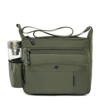 Walk side water glass position anti-splashing rain Oxbridge clothing 12 inch IPAD flat magazine mens single shoulder inclined satchel bag