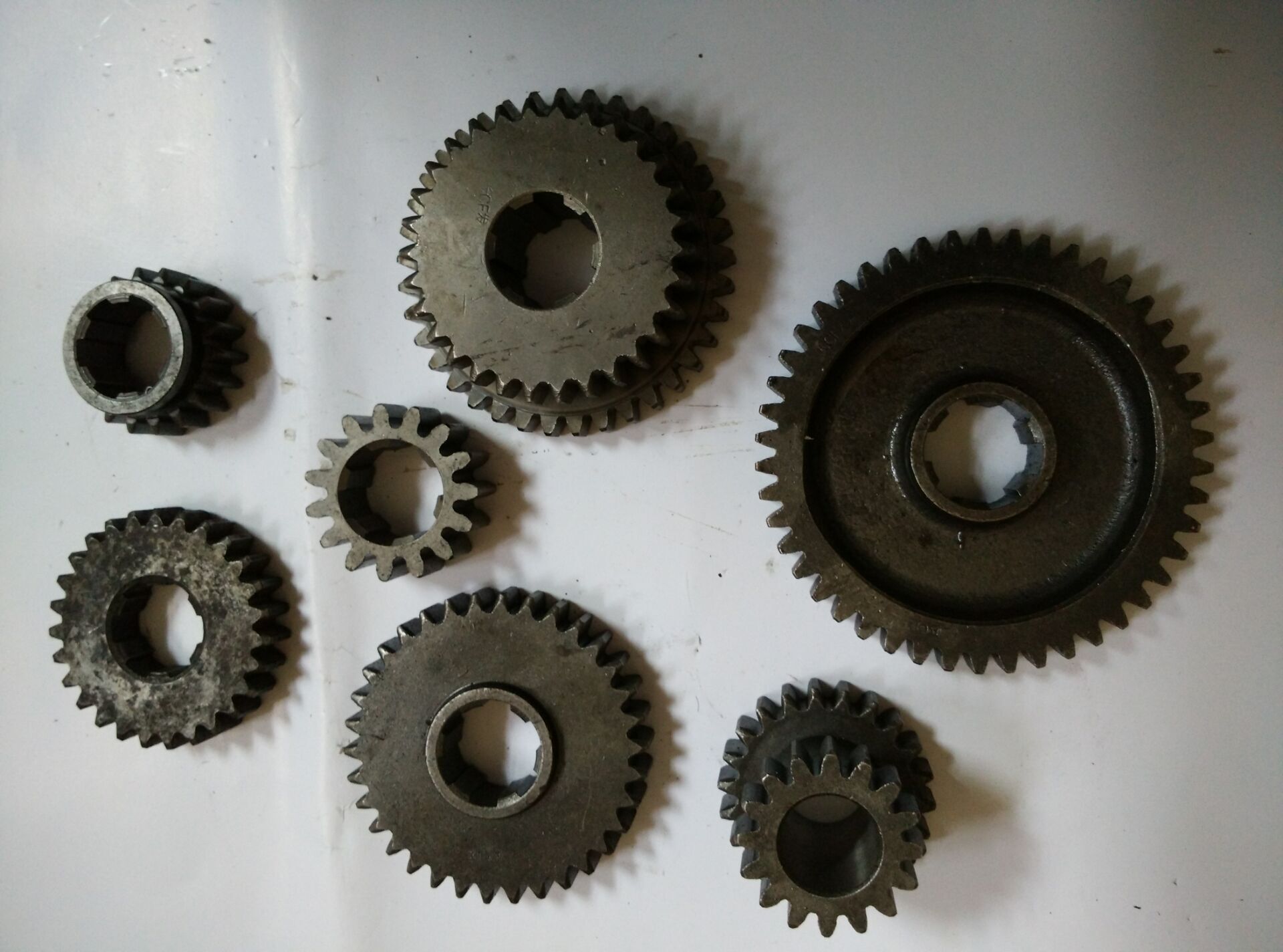 Long Ge running Ma Jinma Shijie Site Engineering tricycle with small four-gear gearbox gear shaft