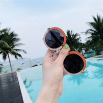 Hawaikuhan Hangzhong niche design baby sunglasses concave artifacts of boys and girls sunglasses personality in super fire