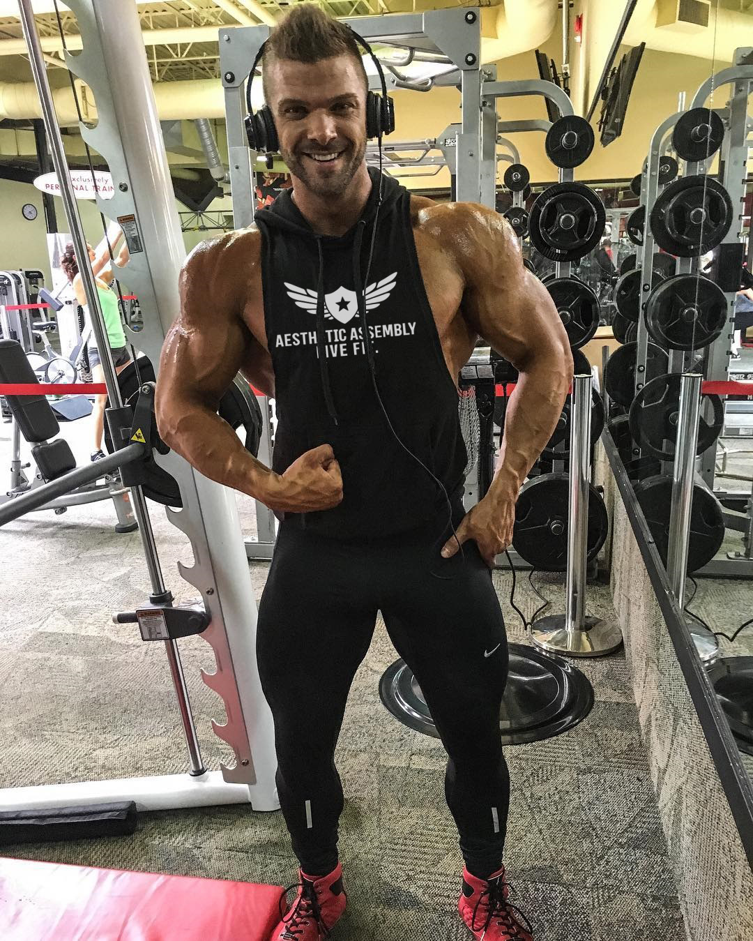 Cơ bắp tập thể dục chó brother new casual trùm đầu vest loại của nam giới không tay thể thao khô nhanh vest đào tạo vest áo gió thể thao nam
