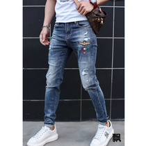 2020 Spring New European and American trend fashion casual embroidery hole elastic slim feet blue jeans men