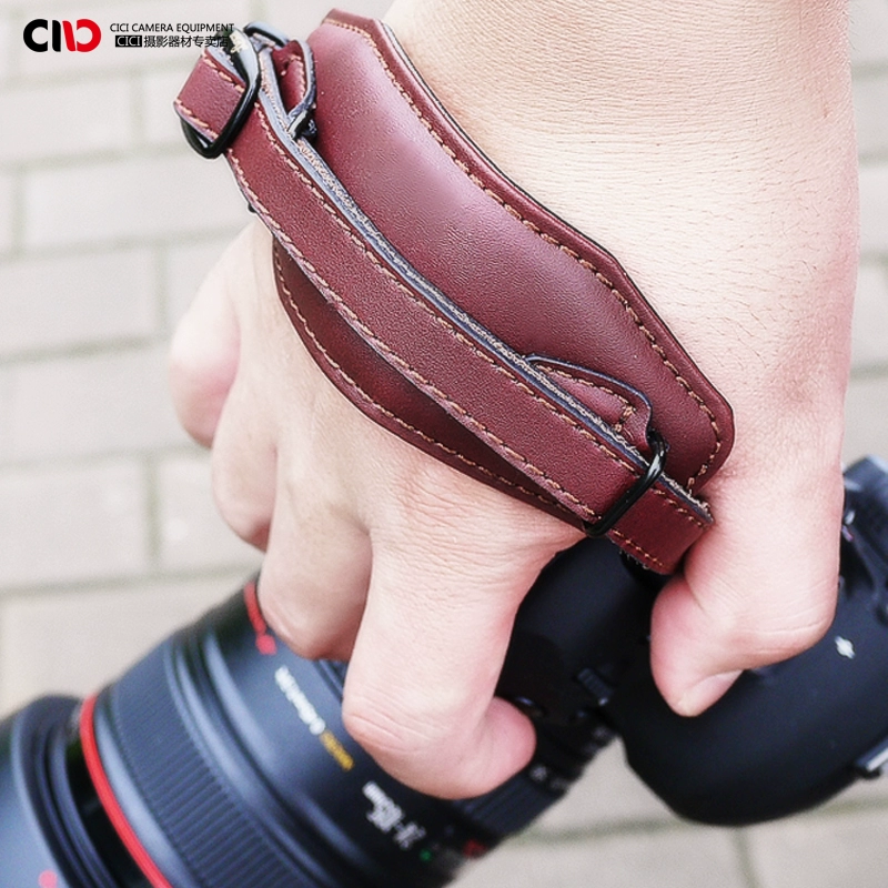 Dây đeo cổ tay thật của máy ảnh da bò Phụ kiện máy ảnh DSLR Canon Máy ảnh đeo tay giải nén dây đeo máy ảnh Dây đeo máy ảnh - Phụ kiện máy ảnh DSLR / đơn