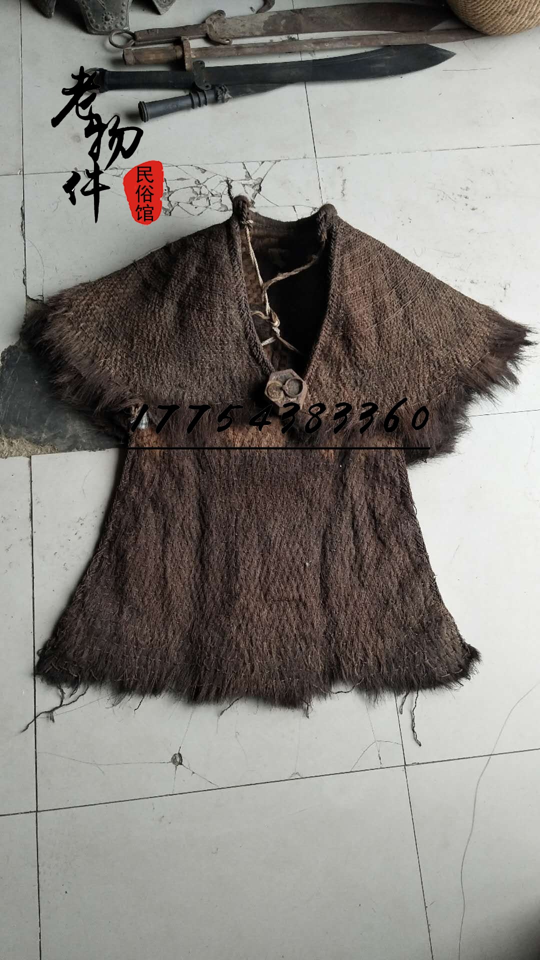 Old objects collection Nostalgic old demoiselle coat Farm house hotel decoration Vintage raincoat Red cultural decoration ornaments