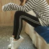 Quần legging thể thao nữ mặc mùa thu mới cotton bên dải chín quần mỏng phần eo cao là quần lửng