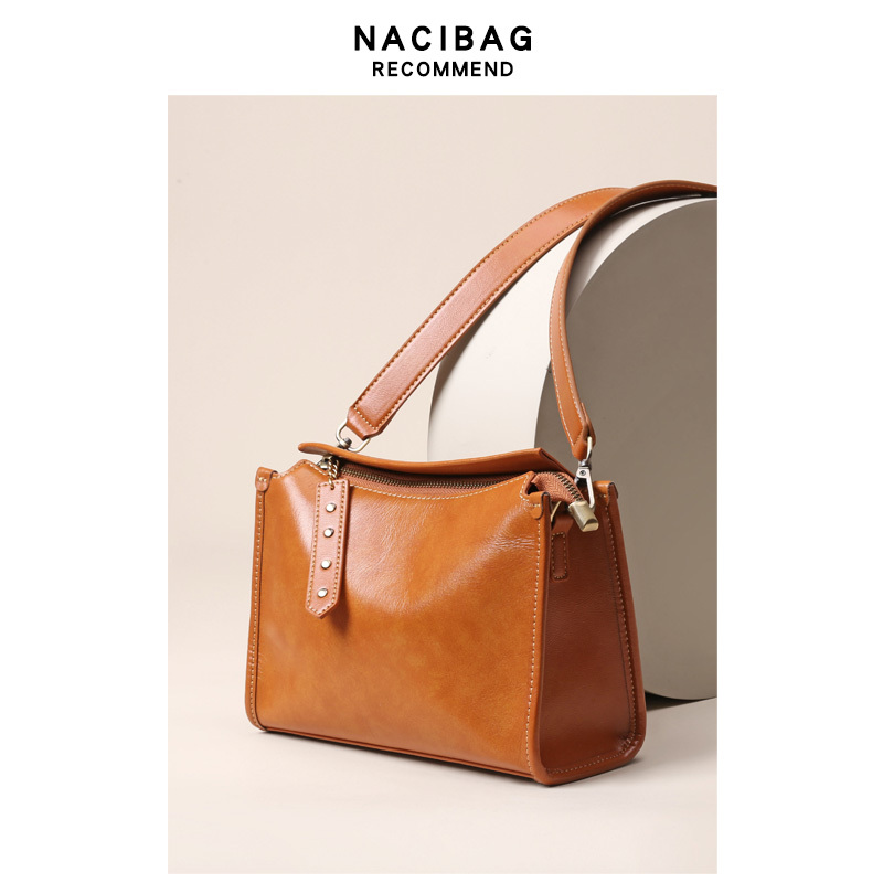 Nachi Vegetable-Tanned First-Layer Cowhide Pillow Bag 2026 New Winter Commuter Bag Retro Shoulder Bag Wide Strap Crossbody Bag