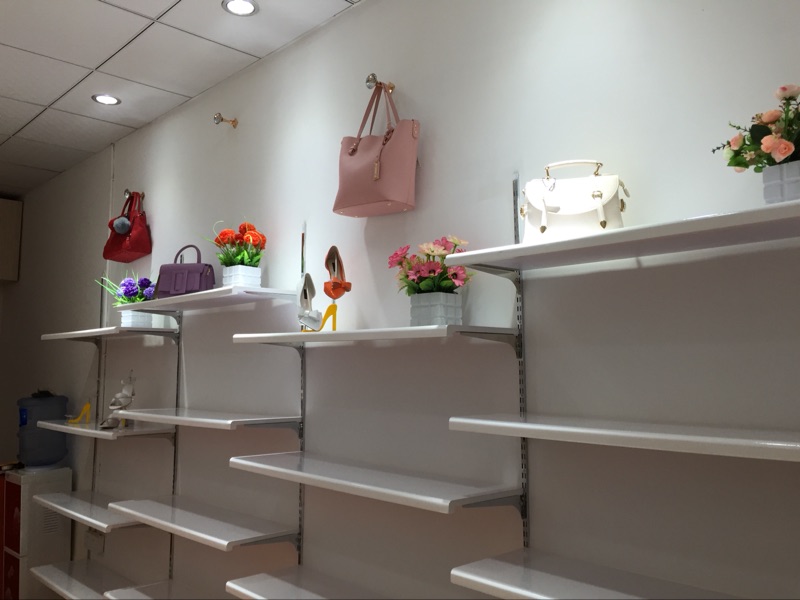 Upper wall giày rack gói hiển thị cửa hàng giày chăm sóc tủ trưng bày tủ nhiều lớp kết hợp lưu trữ giày kệ kệ giá