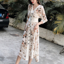 Dress female French snow spinning dress 2021 new noble goddess spirit to finish the skirt and skinny flower dress