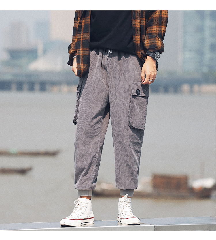 Quần retro kẻ sọc liền màu Nhật Bản quần âu nam mùa thu và mùa đông quần ống loe rộng rãi xu hướng chân nhỏ quần áo nam hàng hiệu
