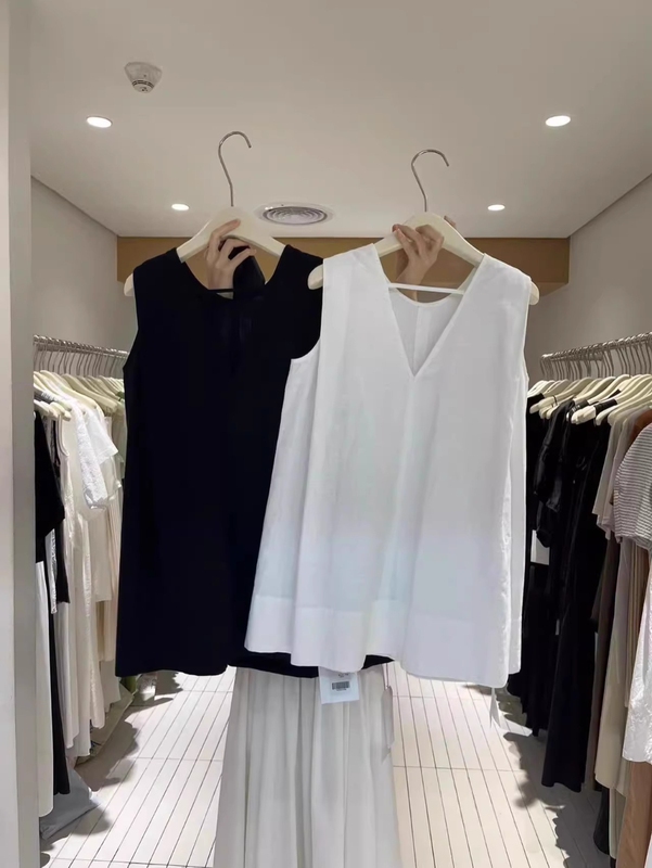 Summer New Style Loose Solid Color V Neck Sleeveless Shirt for Women, High-End Hong Kong Style Unique Back Cut Out Outer Top Summer New Style Loose Solid Color V Neck Sleeveless Shirt for Women, High-End Hong Kong Style Unique Back Cut Out Outer Top