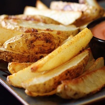 McCann original potato wedges with skin fried semi-finished product Western potato wedges original potato wedges with skin 8 slices 2 27Kg