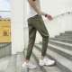 Mùa thu quần nam chân nhỏ quần harem quần chín quần nam phiên bản Hàn Quốc của xu hướng tự tu luyện chân váy dụng cụ quần nam quần đùi