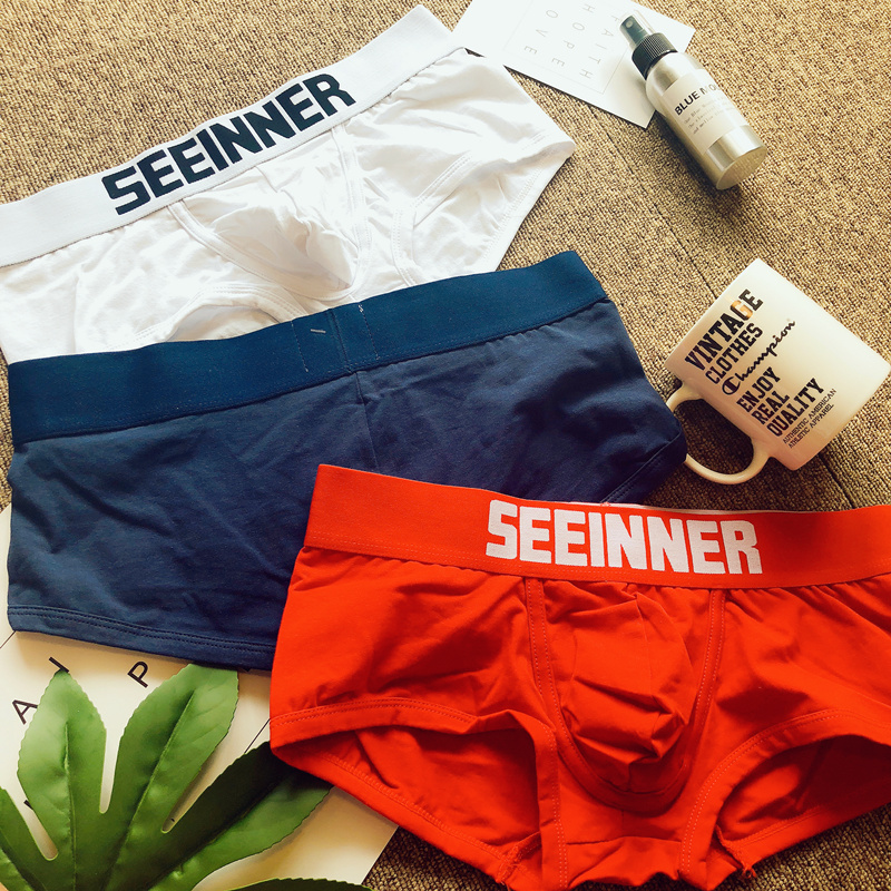 Tide đồ lót nam cotton thấp eo gợi cảm trẻ trung thanh niên màu rắn thoải mái thể thao boxer trắng đồ lót quan lot nu dang dui